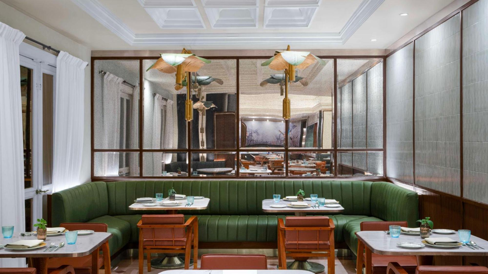 Hilton Mumbai International Airport Hotel Exterior photo The interior of the restaurant
